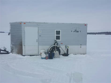 A small, concrete building housed surplus items for sale and produced sheds and doghouses. . Ice castle for sale